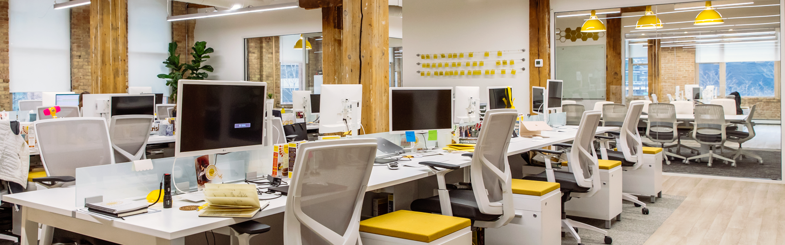 Simple Mills office space lined with workspaces and conference rooms