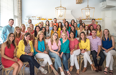 The entire Simple Mills staff gathered in kitchen