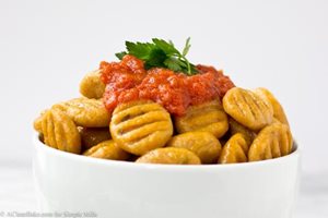 Sweet potato gnocchi made with almond flour baking mix pizza dough topped with red tomato sauce