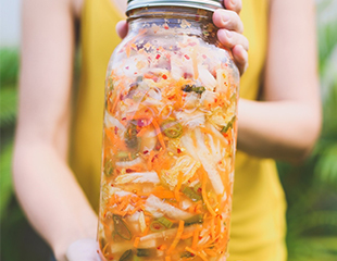 Jar of fermented foods is a good snack to consume to promote gut health