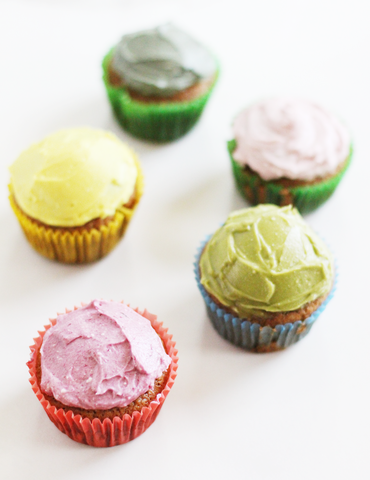 Assorted frosted cupcakes with different color frosting